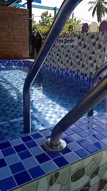 PURPLE SWIMMING POOL